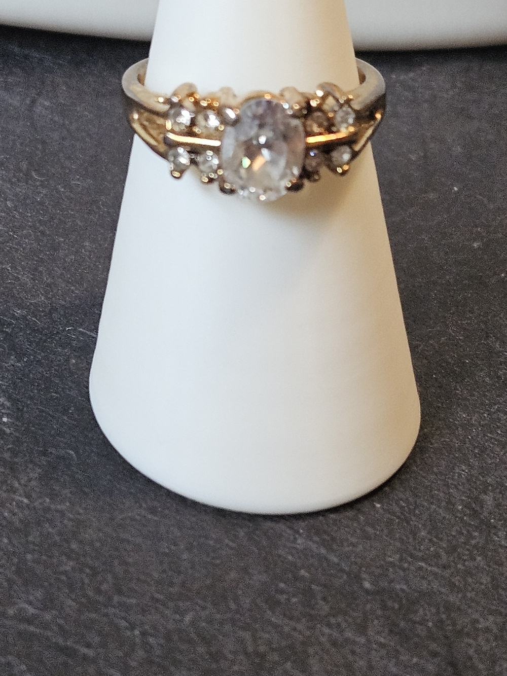 Vintage Gold Tone Oval Clear Stone Ring with Side Accents. Size 8